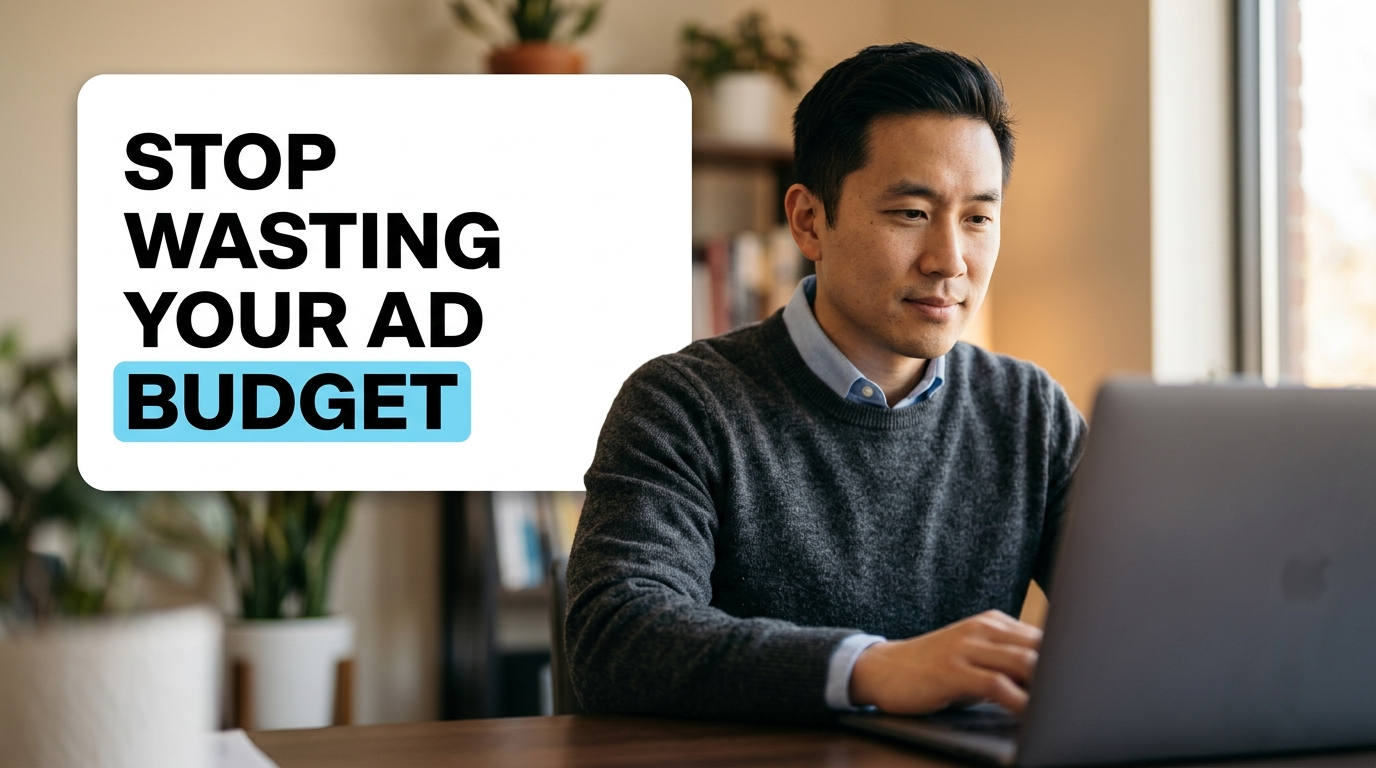 Man using laptop beside ad budget warning